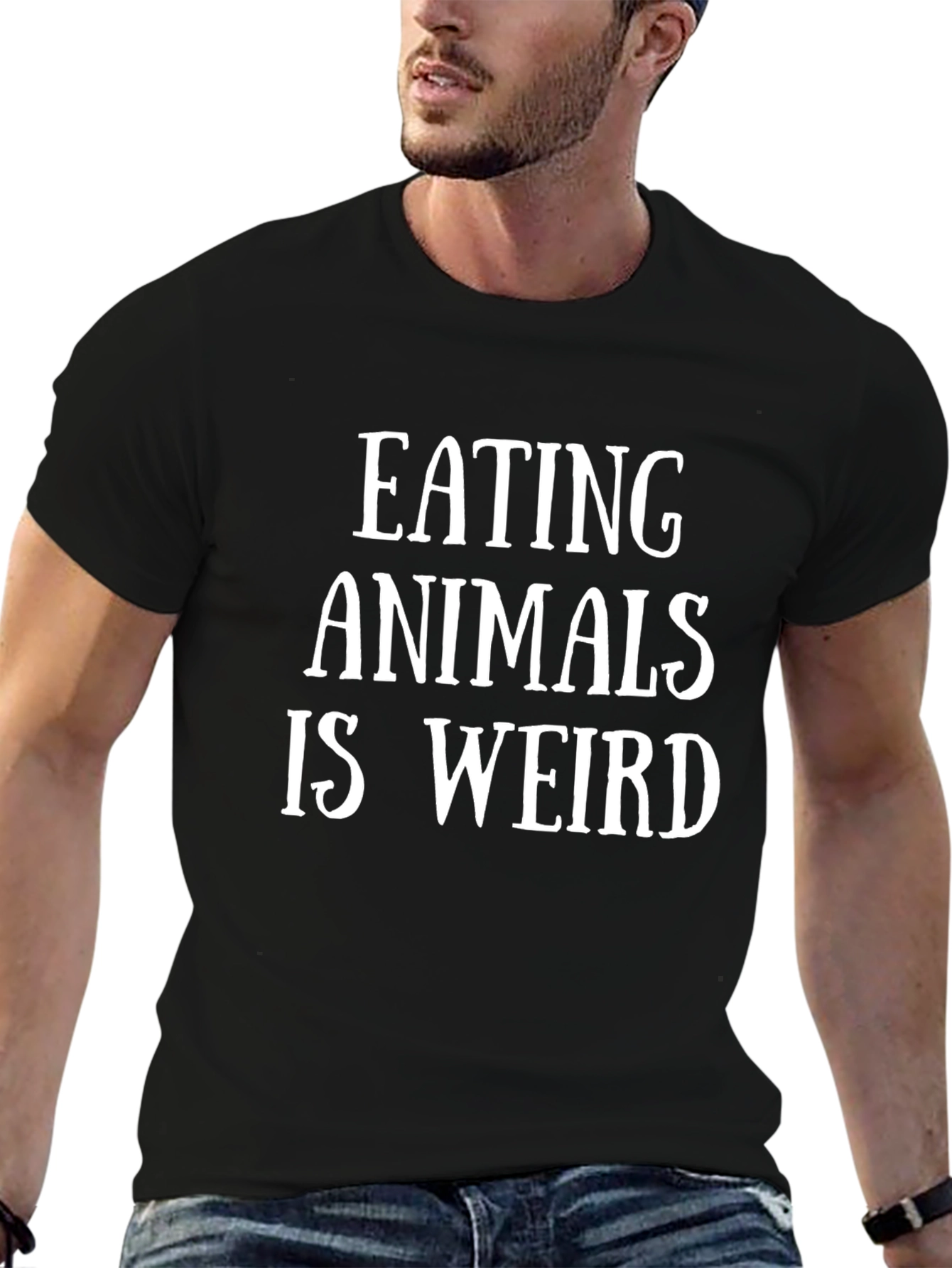 Camiseta Negra con Mensaje Vegano: Comer Animales es Raro