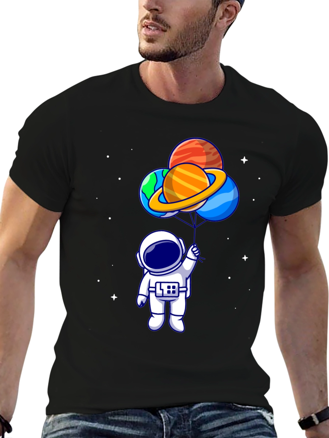 Camiseta Negra Astronauta con Globos de Planetas